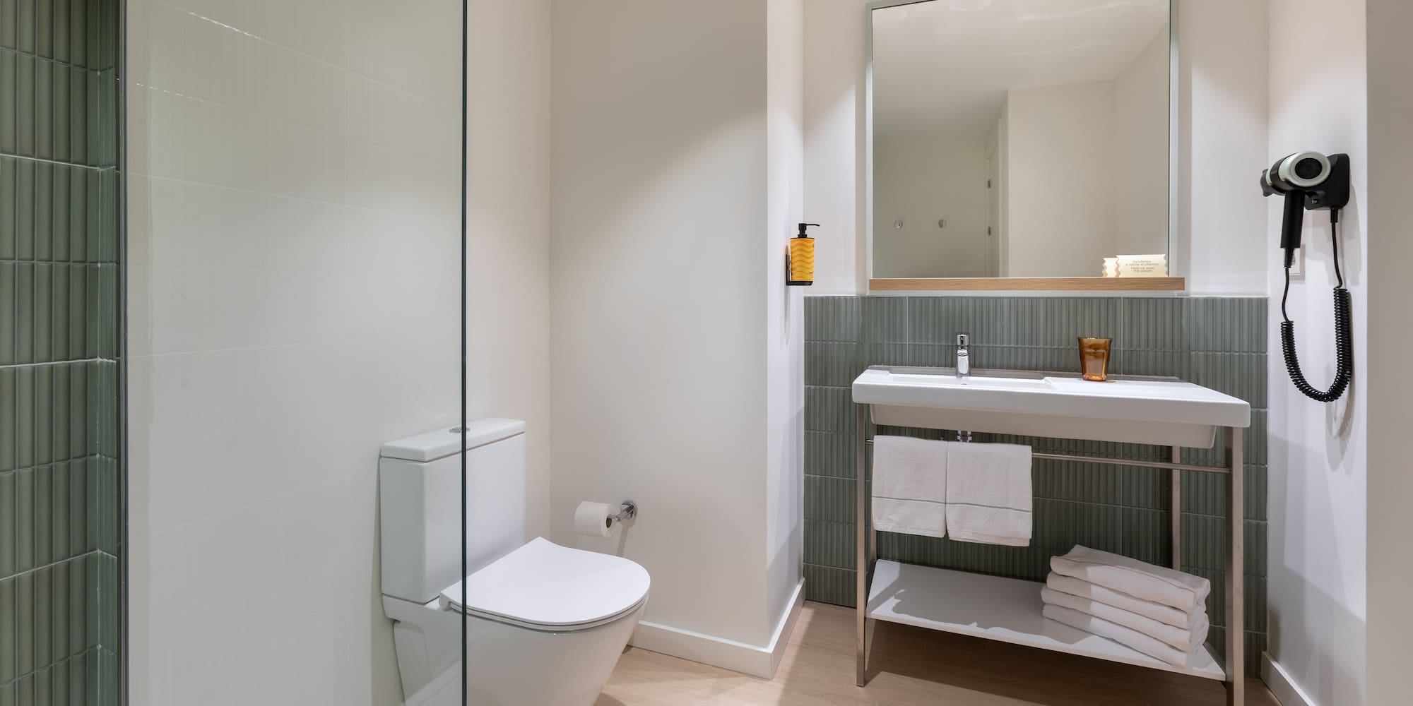 a bathroom with a sink and toilet