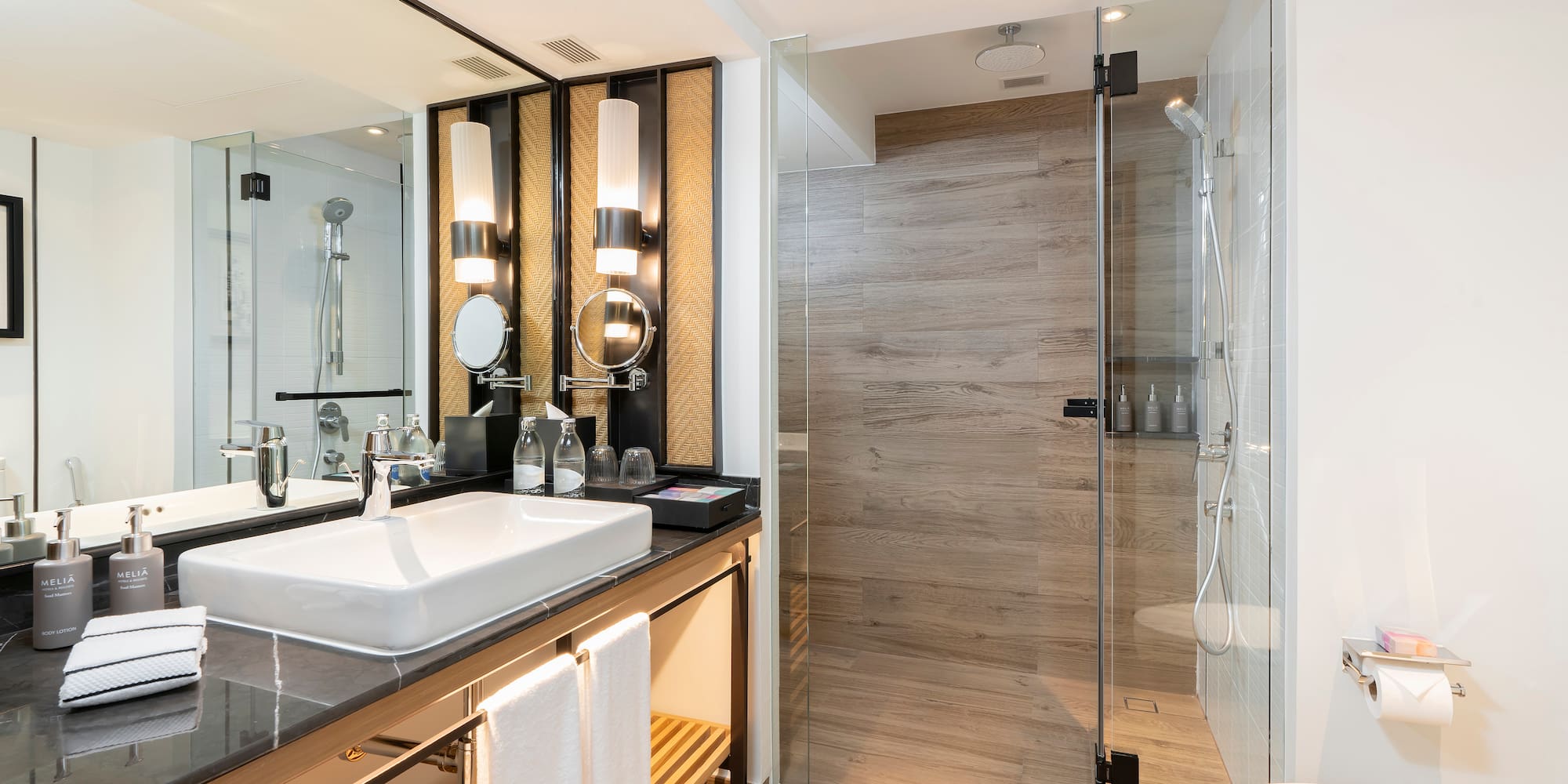 a bathroom with a shower and sink