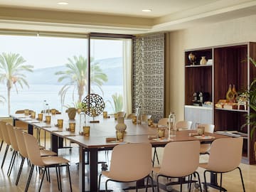 a large conference room with a large table and chairs