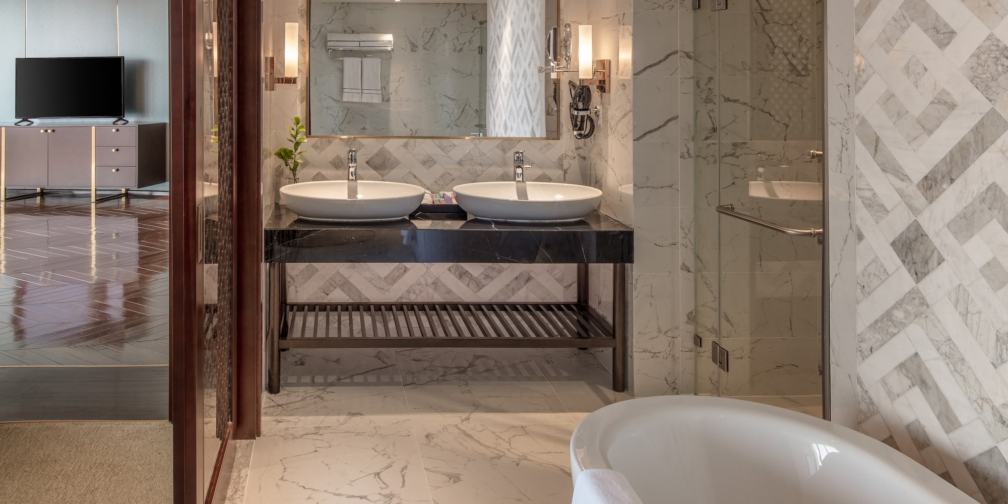 a bathroom with marble tile floor and marble countertop