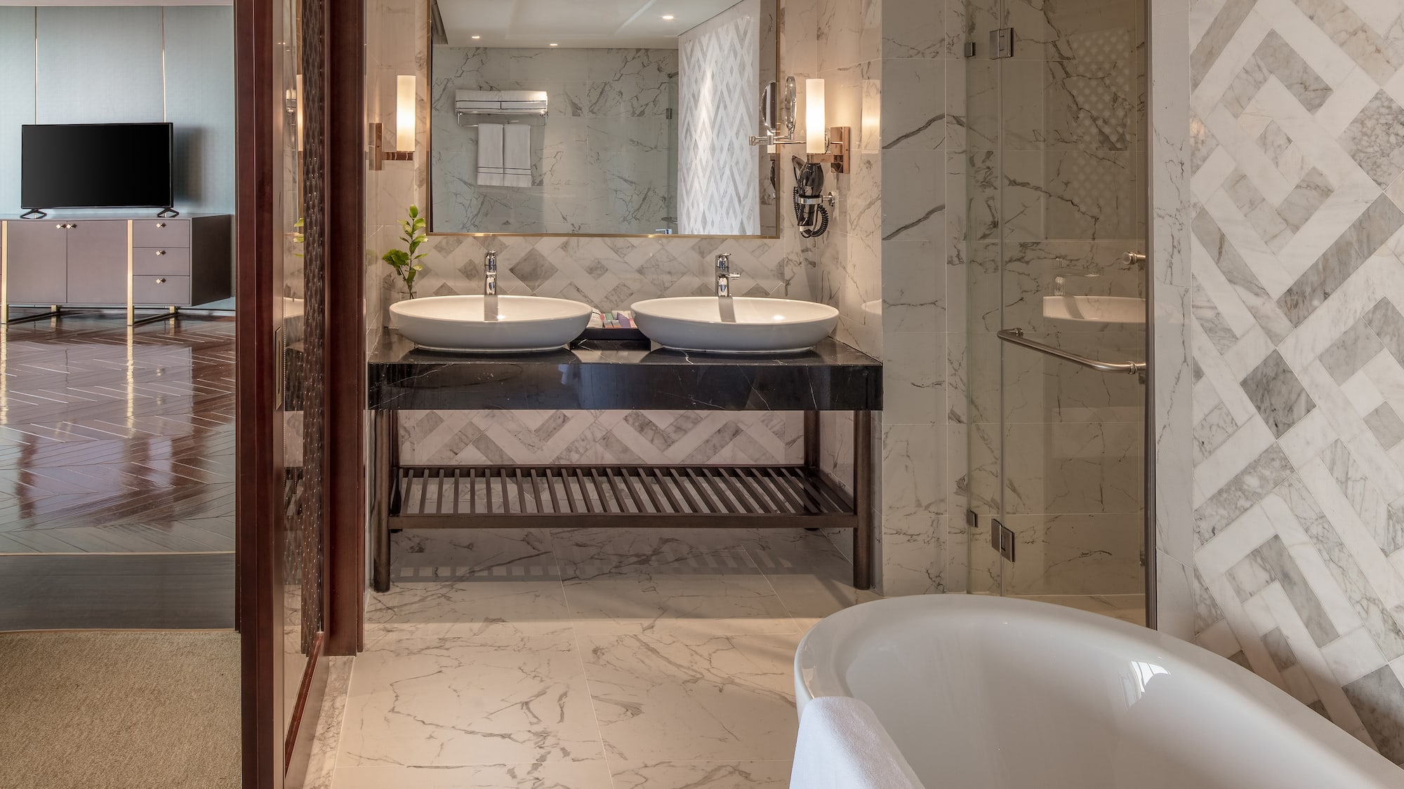 a bathroom with marble tile floor and marble countertop