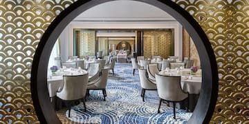 a room with tables and chairs