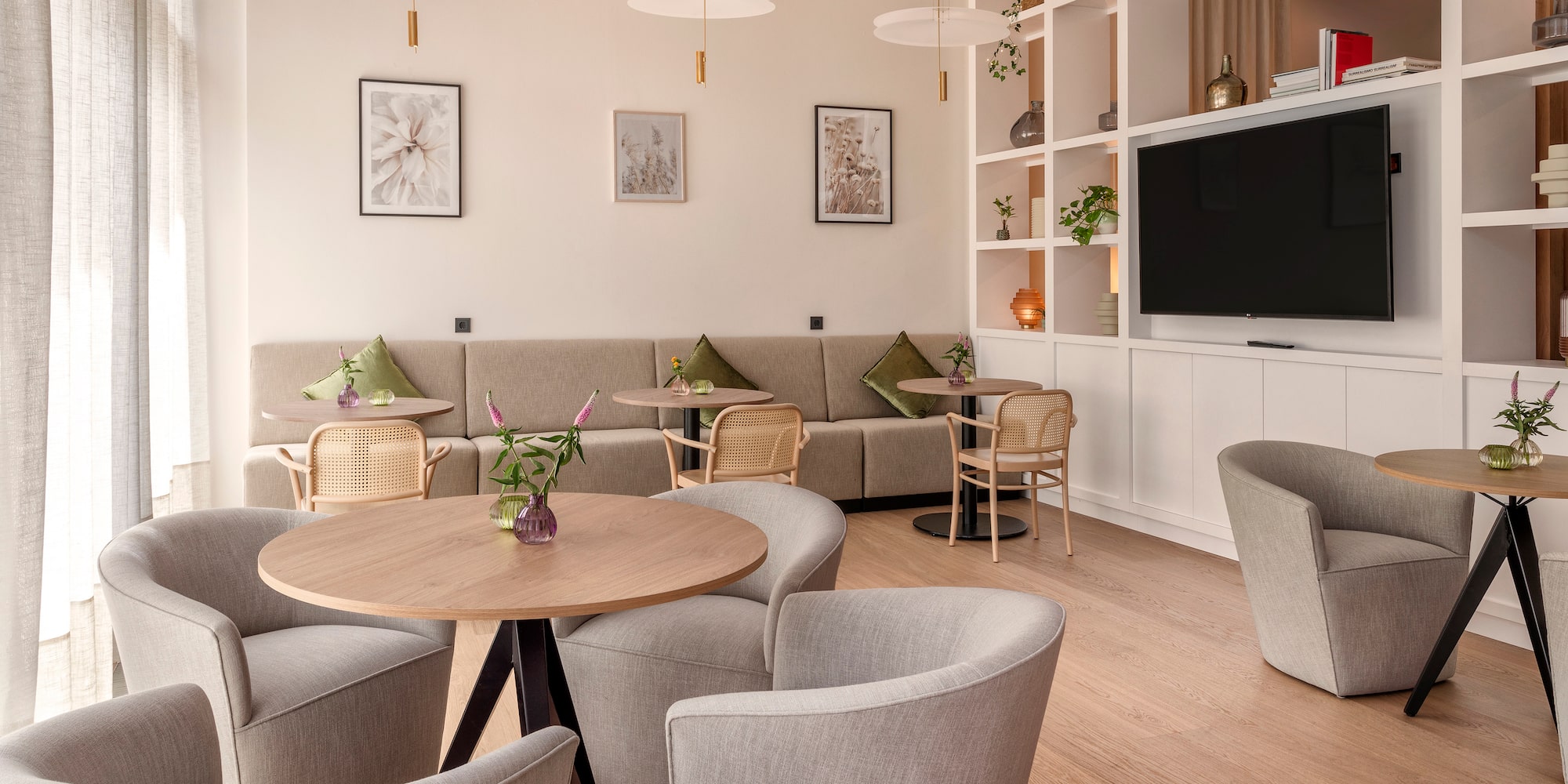 a room with a couch and tables