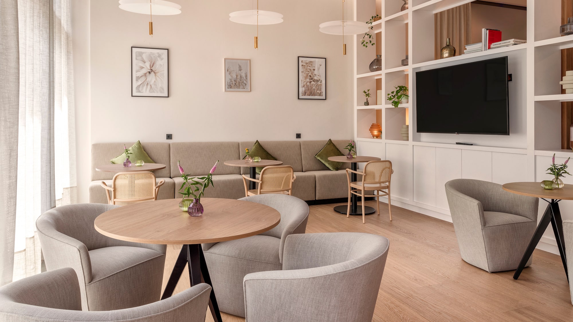 a room with a couch and tables