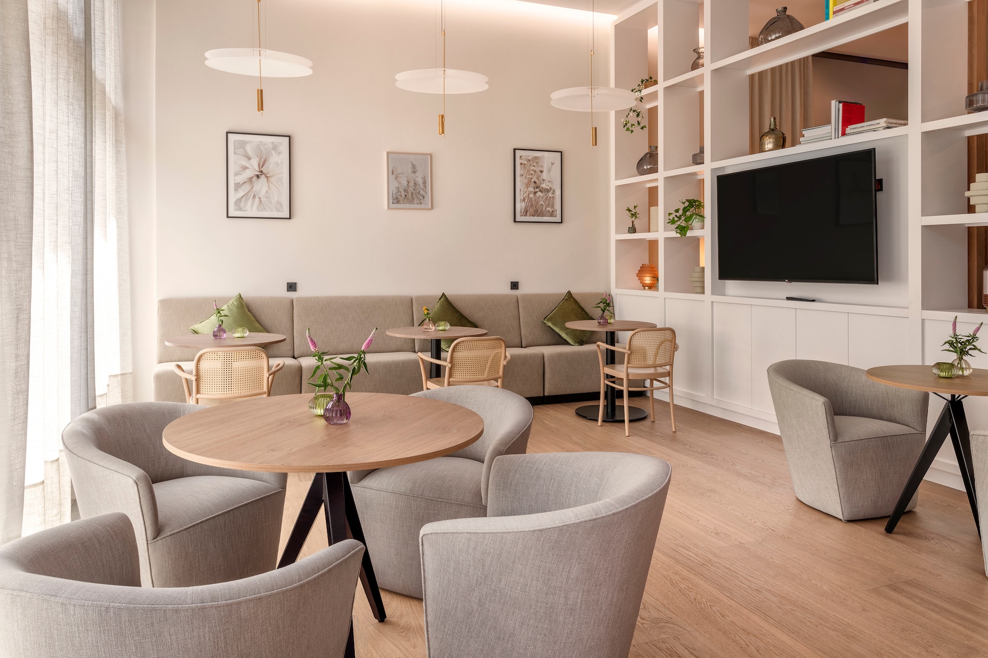 a room with a couch and tables