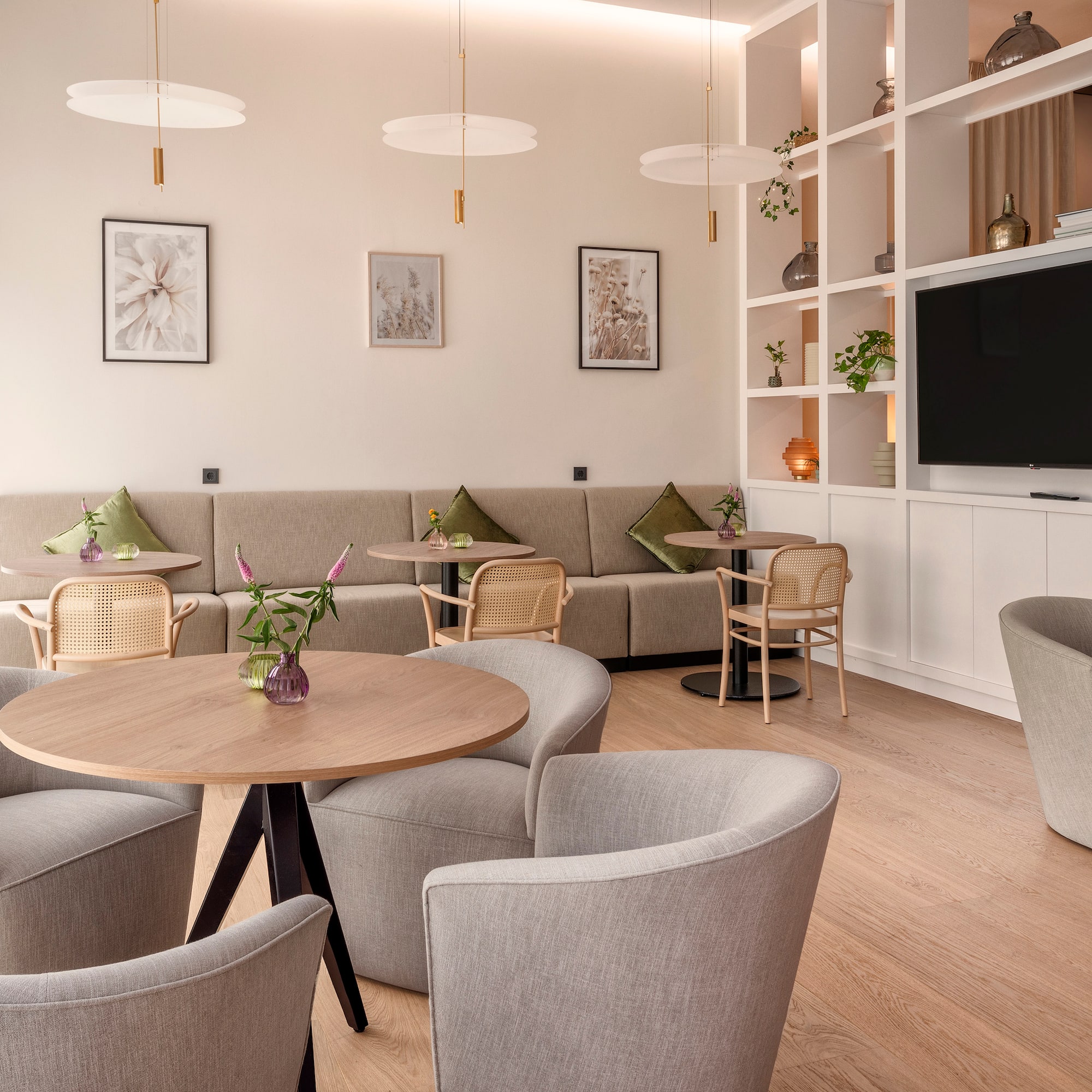 a room with a couch and tables