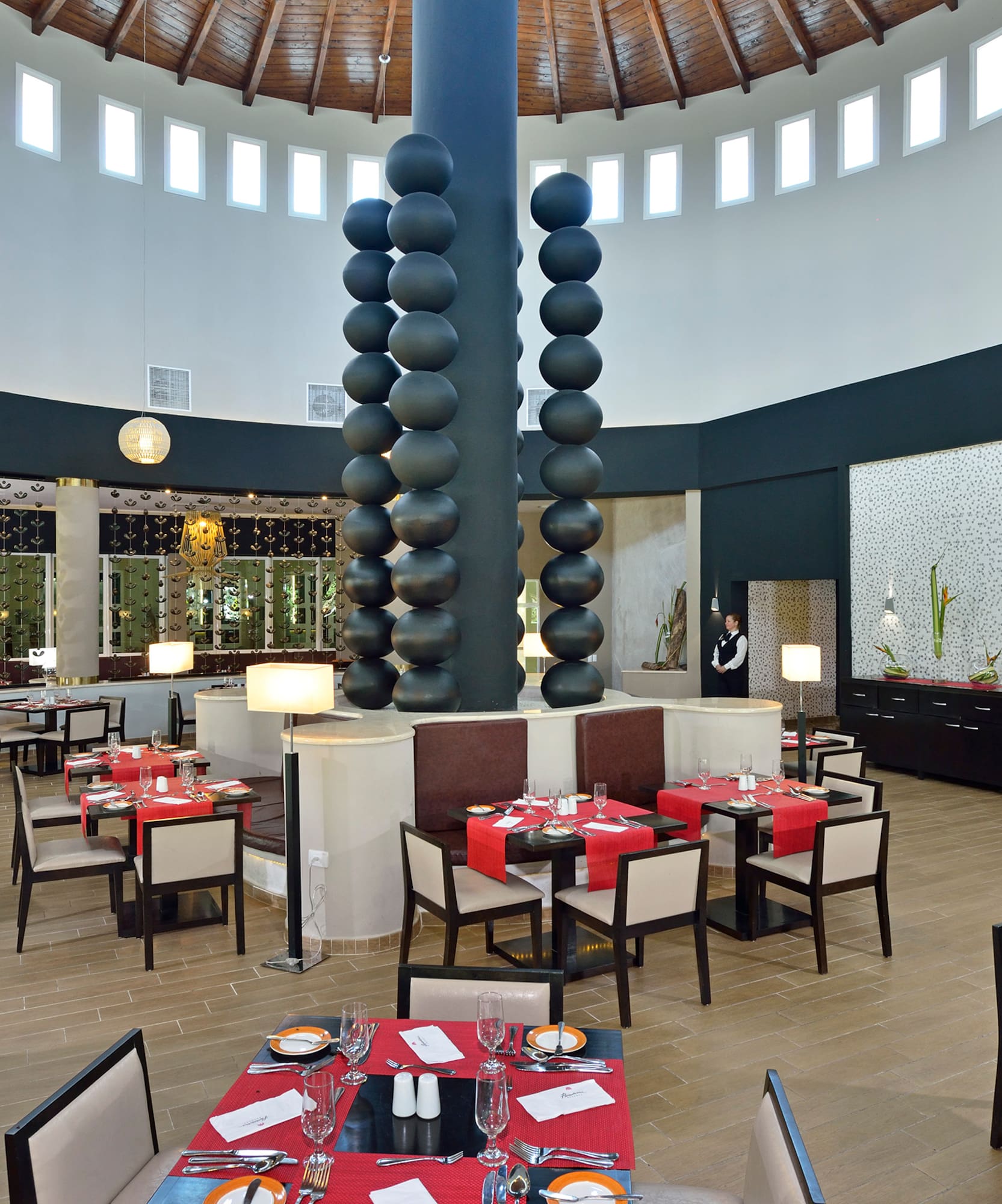 a restaurant with tables and chairs