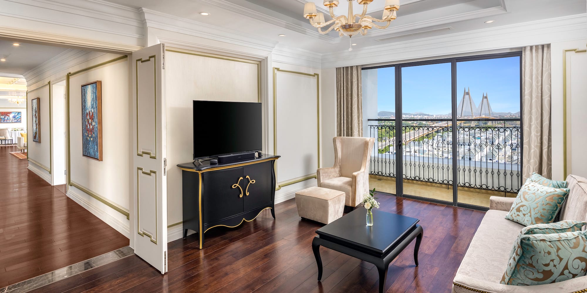 a living room with a television and a table