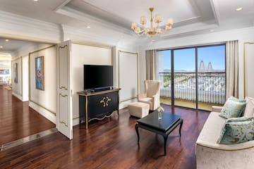a living room with a television and a table