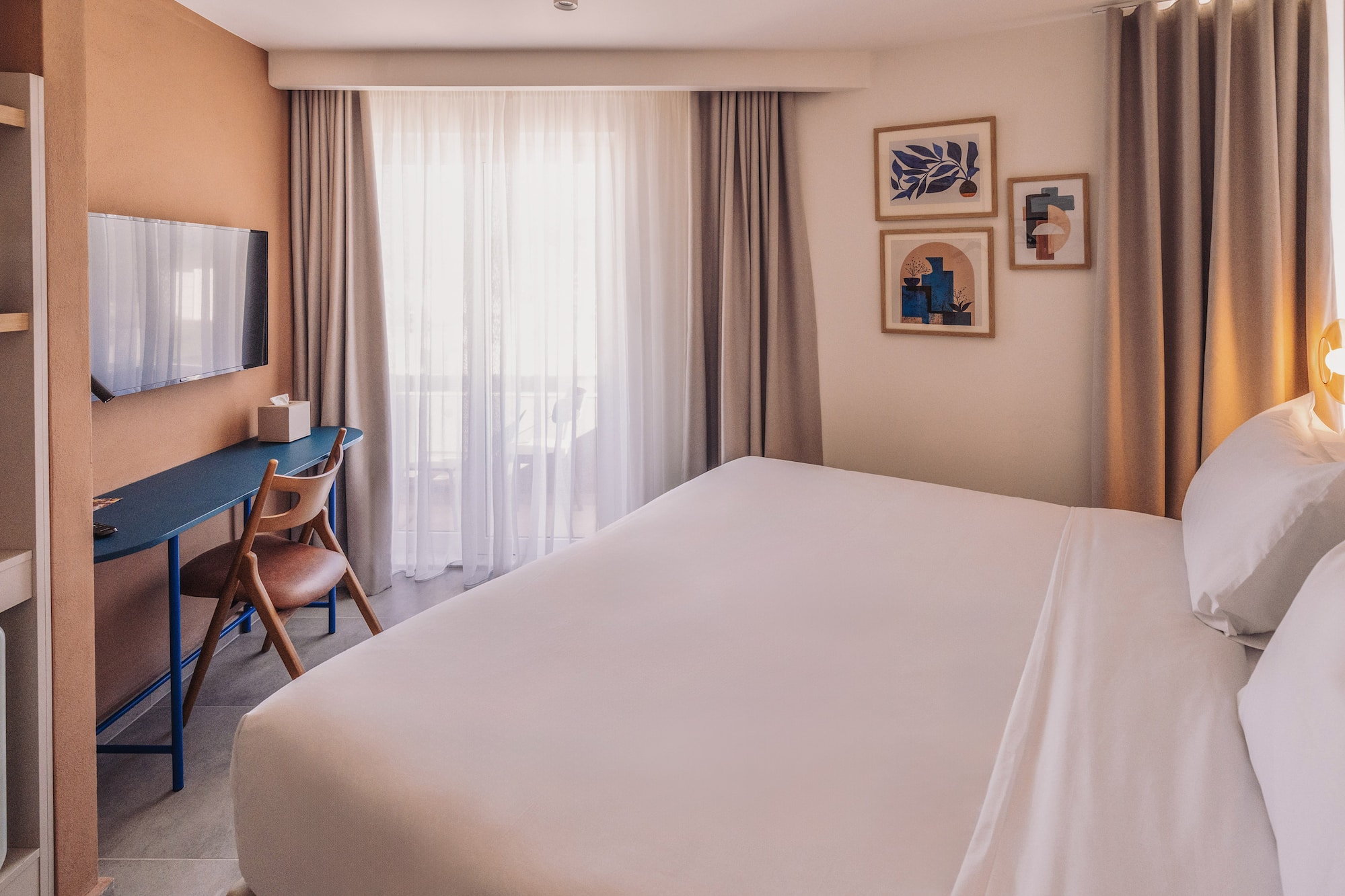 a bed in a hotel room