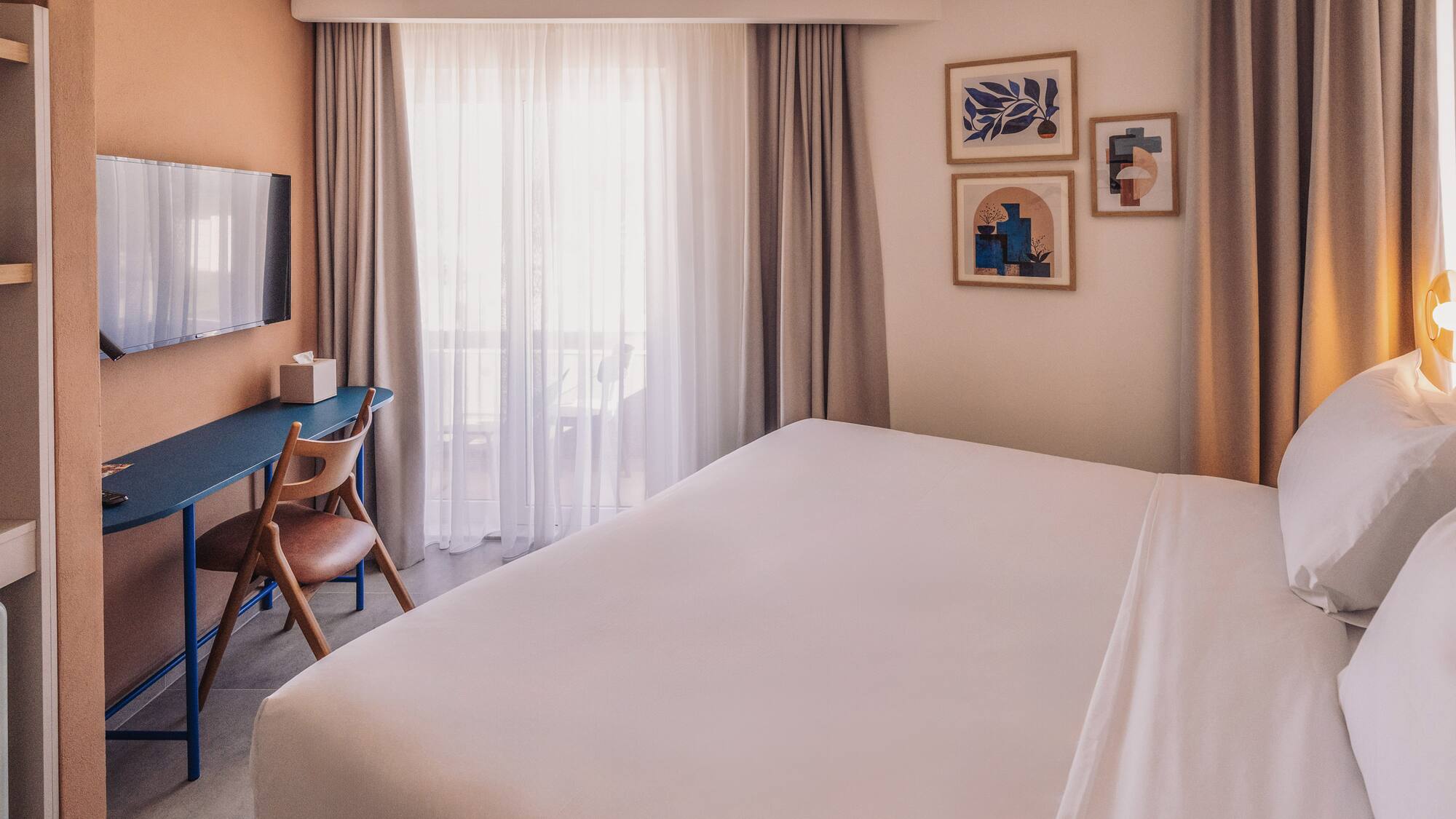 a bed in a hotel room