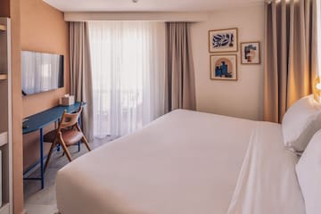 a bed in a hotel room