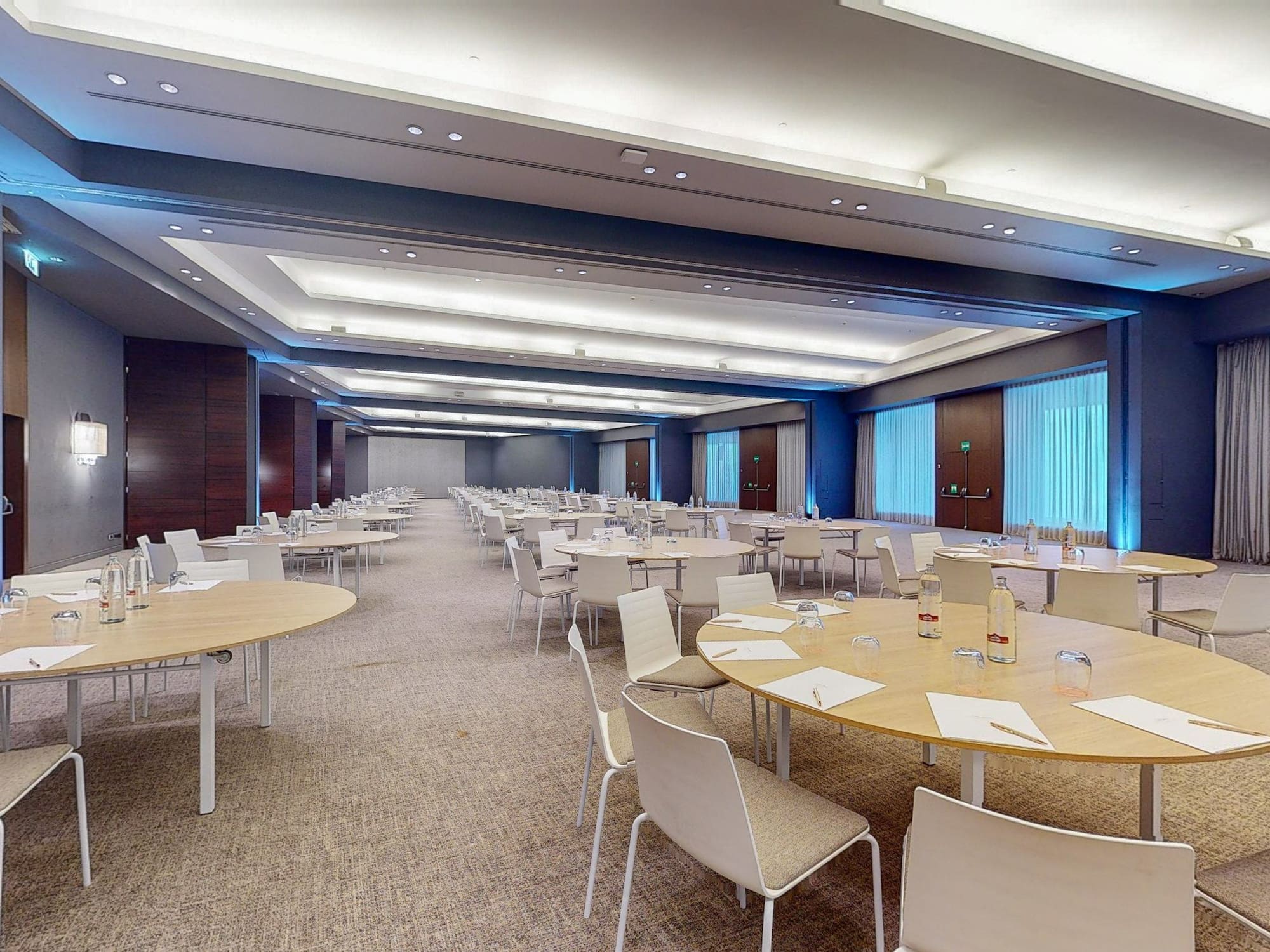 a room with tables and chairs