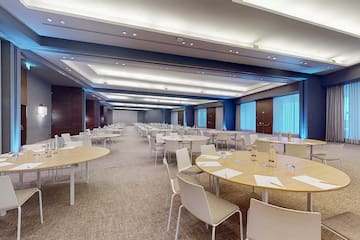 a room with tables and chairs