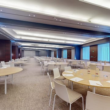 a room with tables and chairs