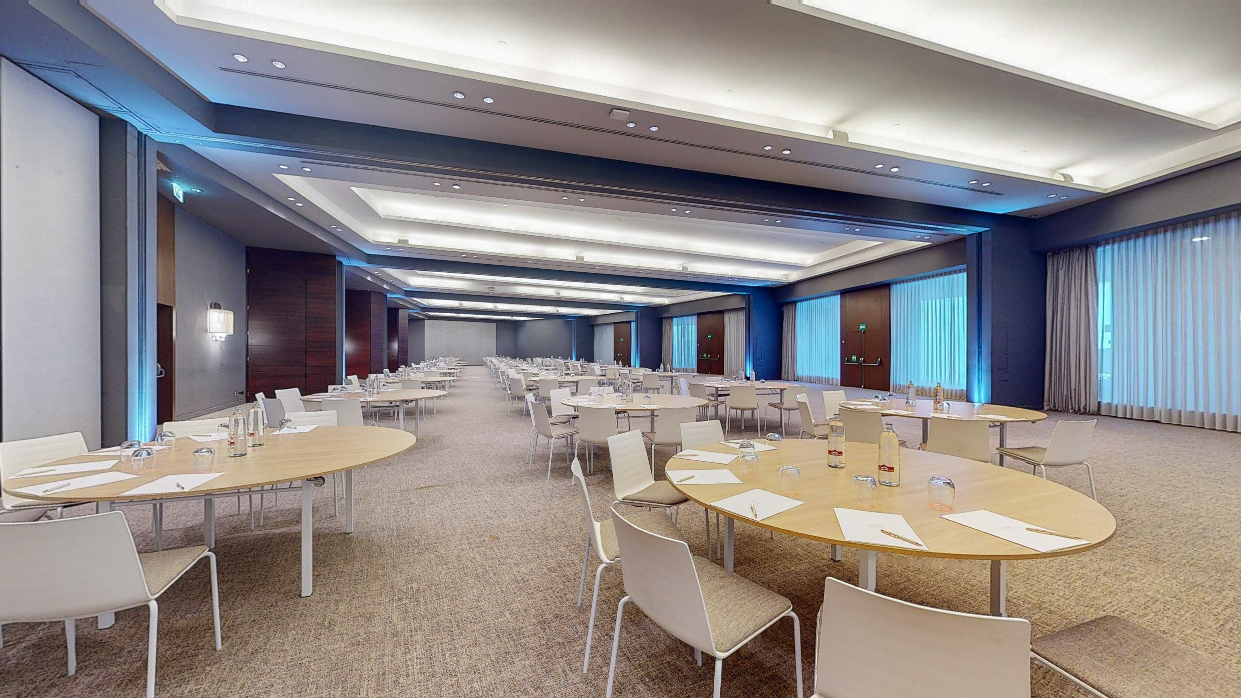 a room with tables and chairs