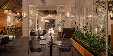 a room with a table and chairs