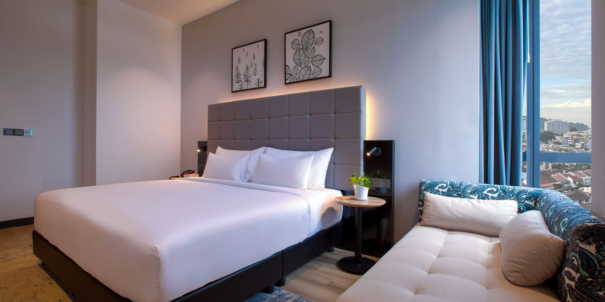 a bed and a couch in a room