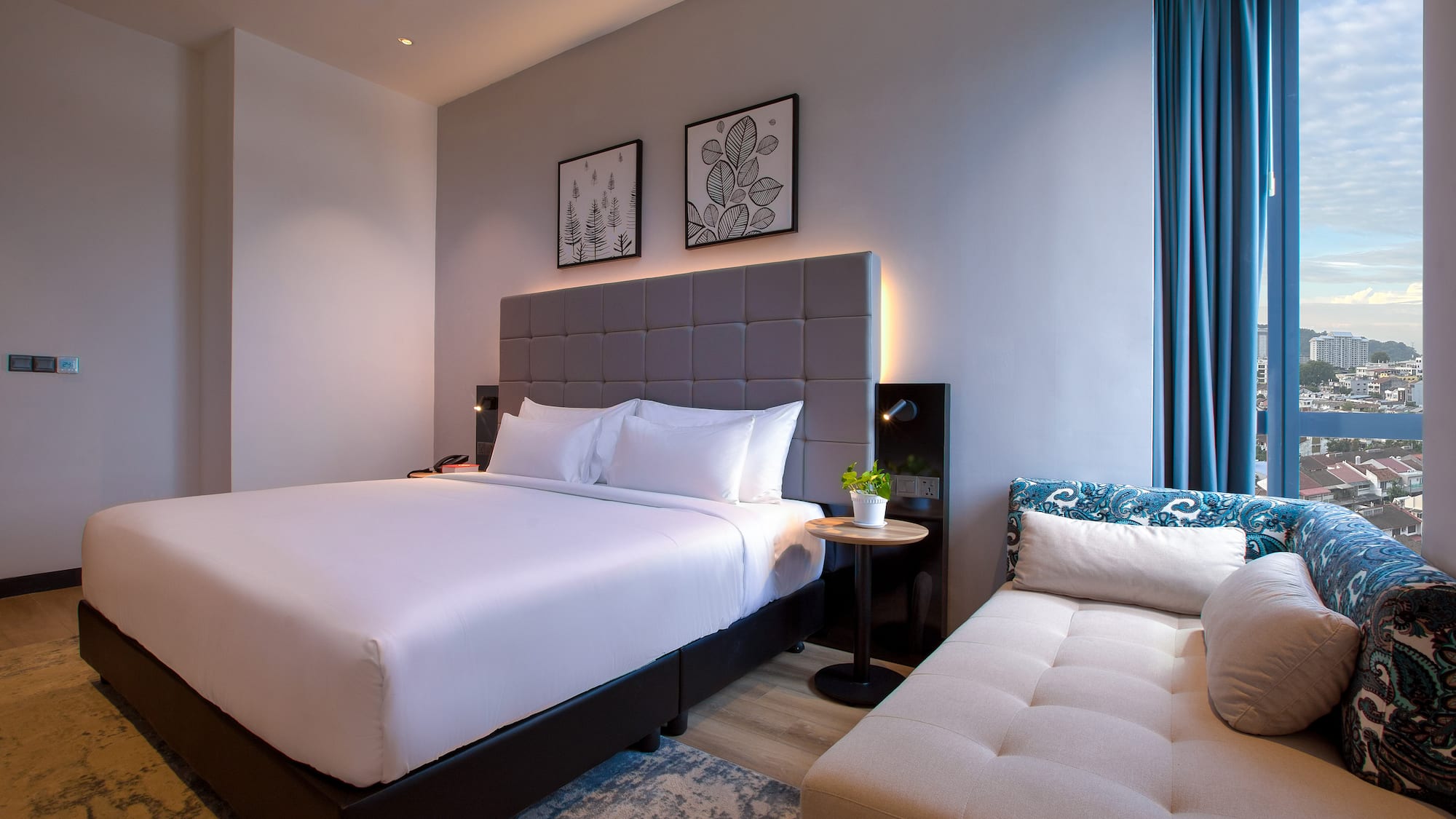 a bed and a couch in a room