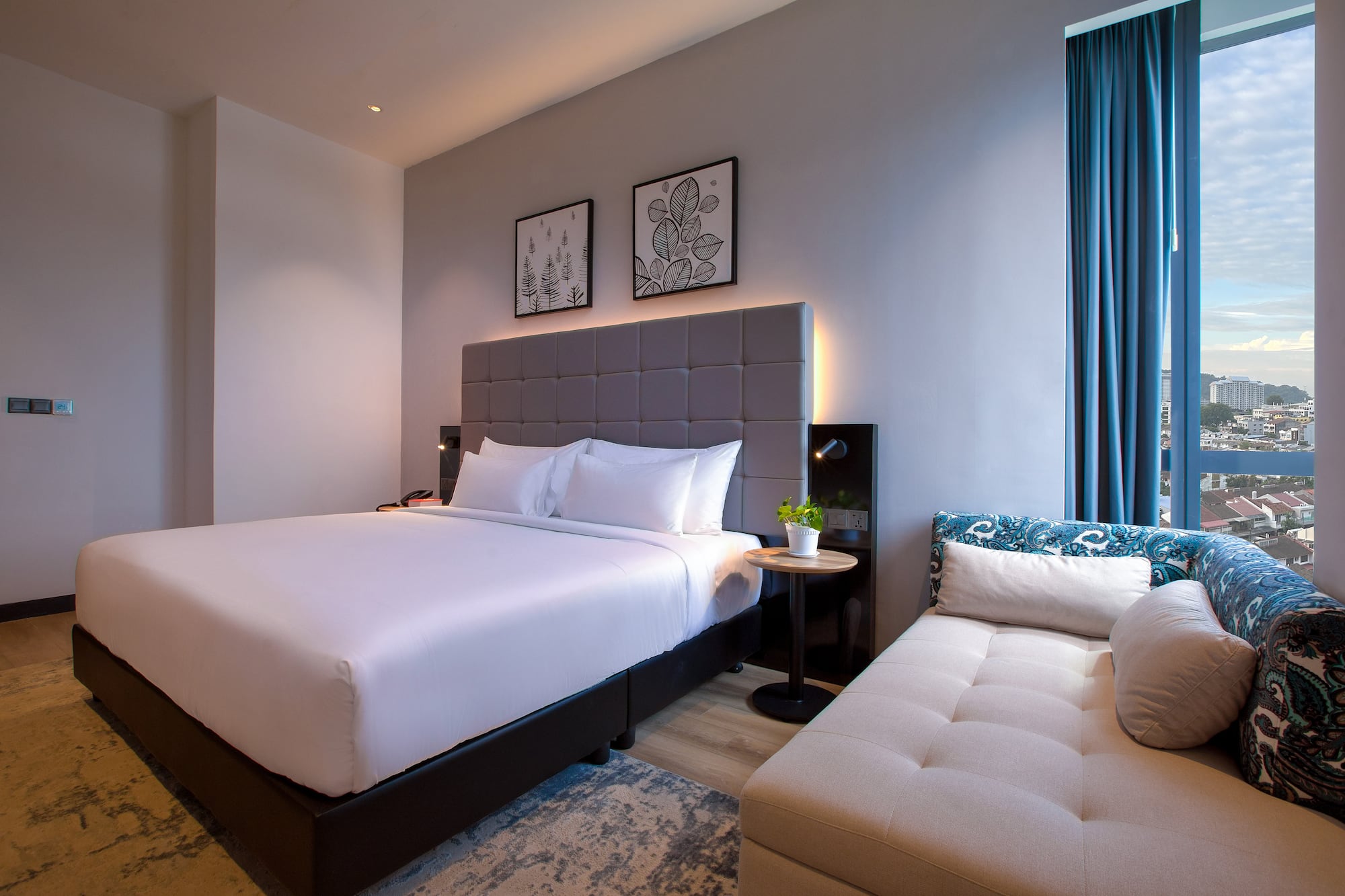 a bed and a couch in a room