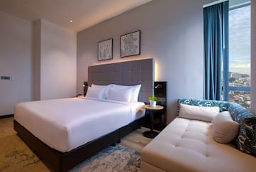 a bed and a couch in a room