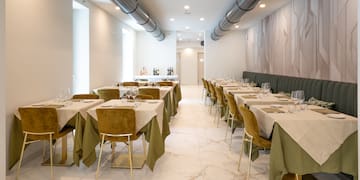 a room with tables and chairs