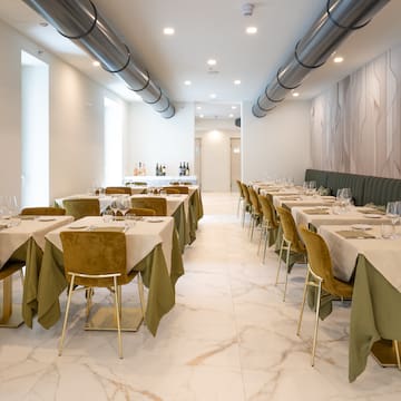 a room with tables and chairs