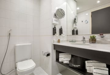 a bathroom with a sink and mirror