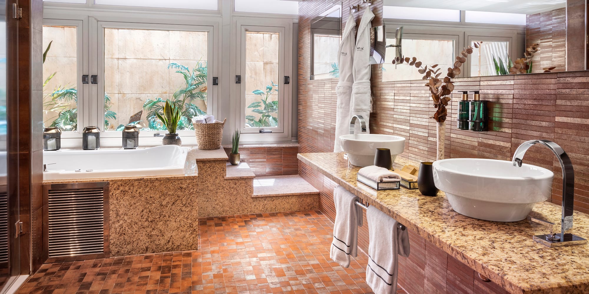 a bathroom with a tub and sink