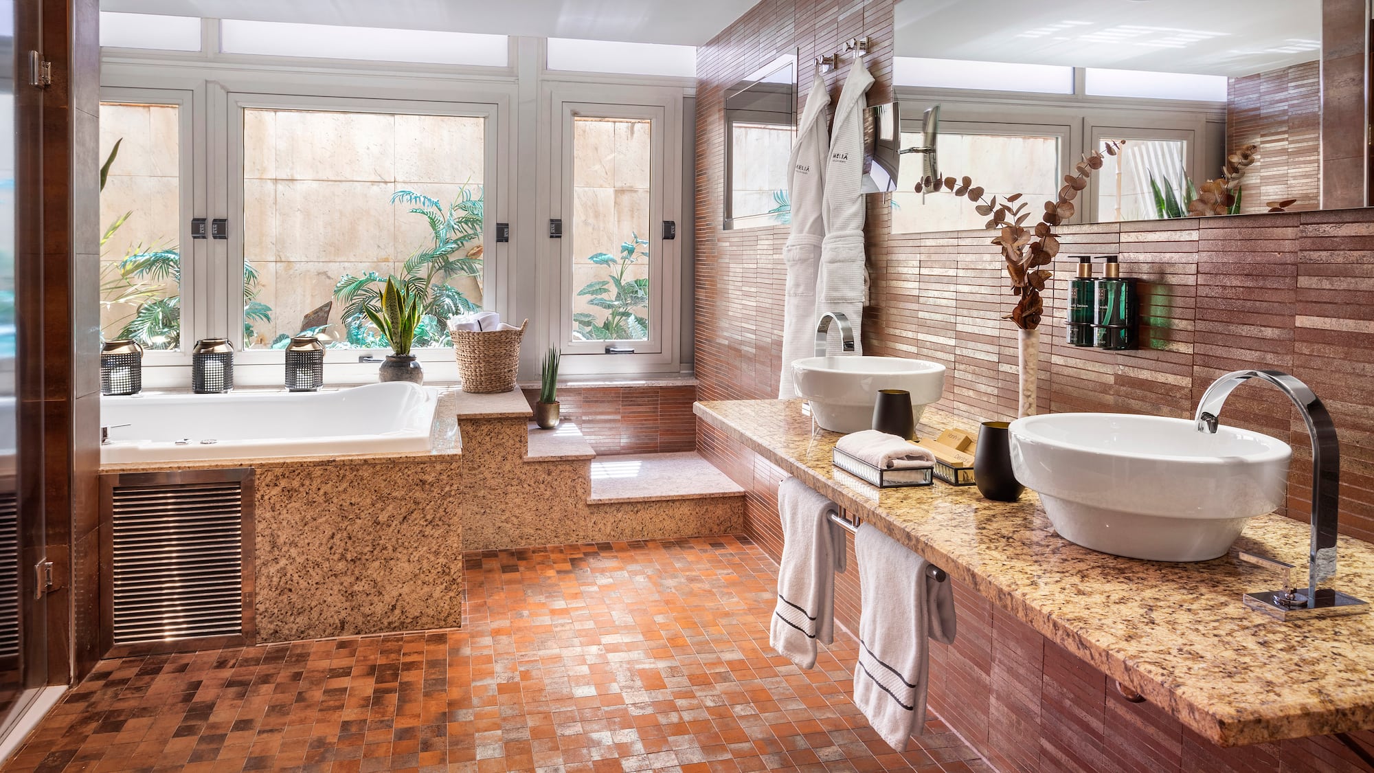 a bathroom with a tub and sink