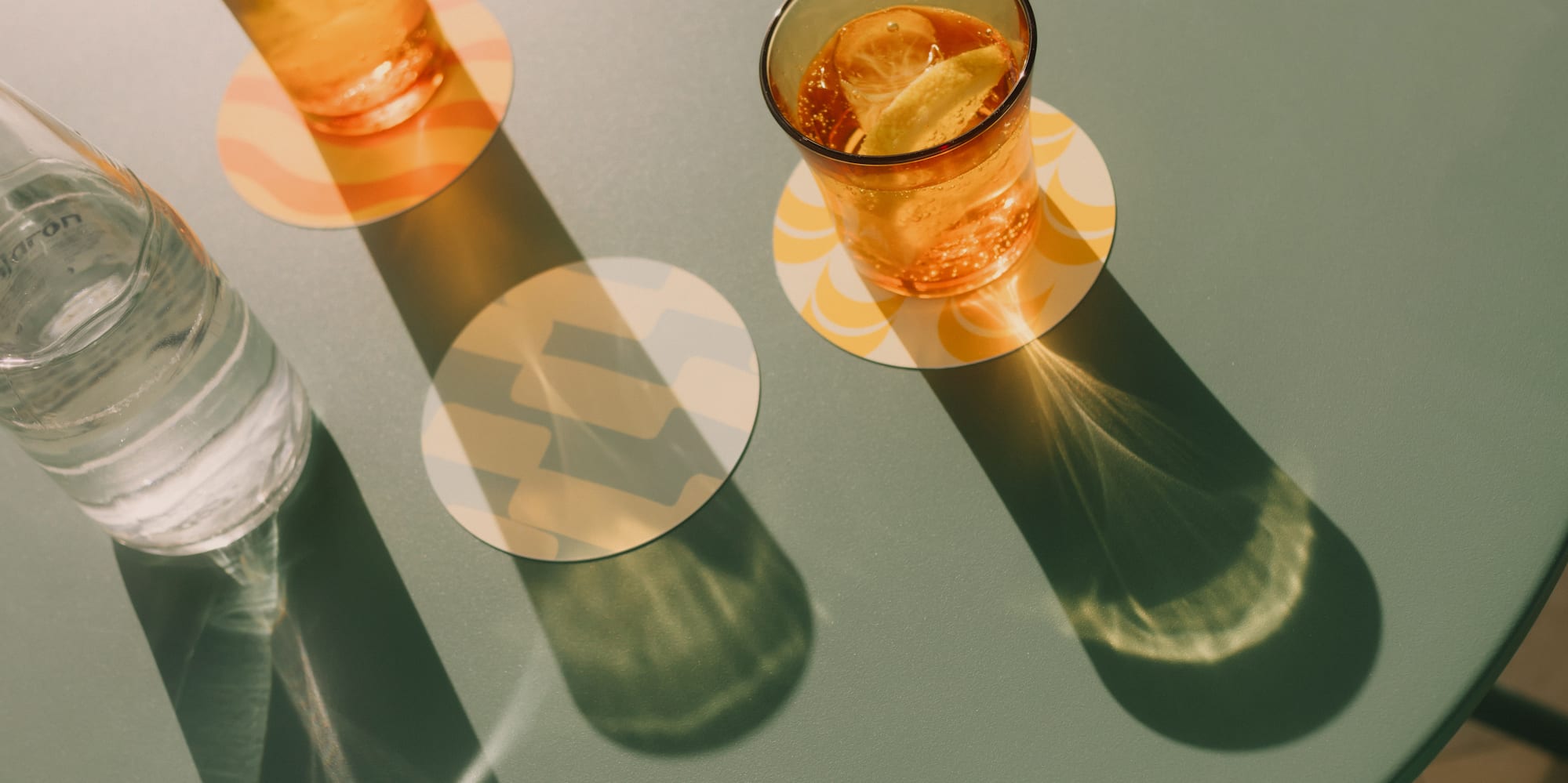 a glass of liquid on a table