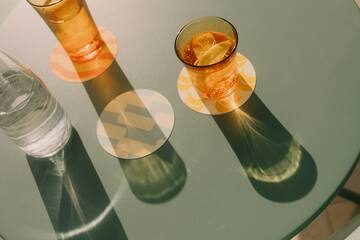 a glass of liquid on a table