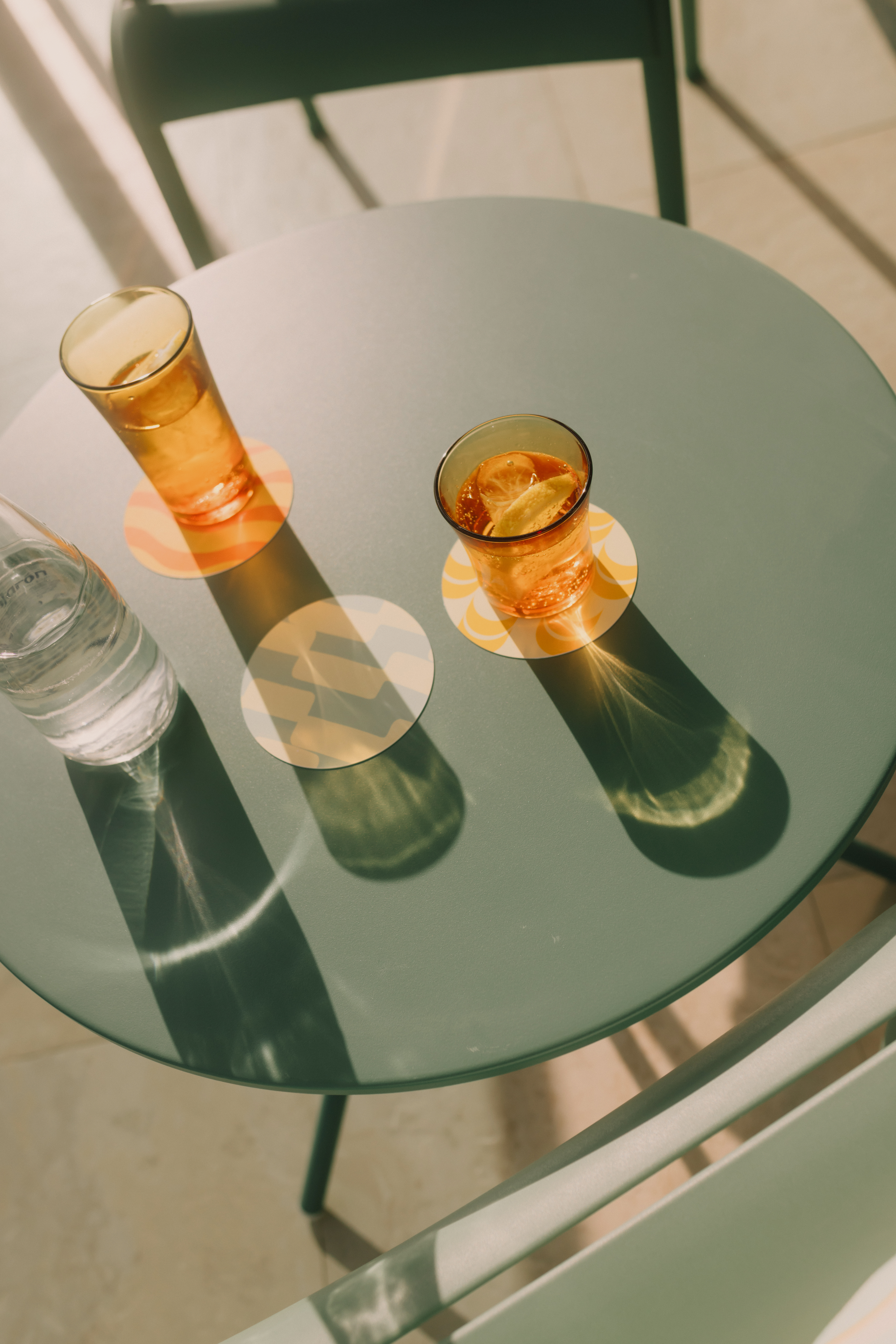 a glass of liquid on a table