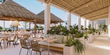 a patio with a table and chairs