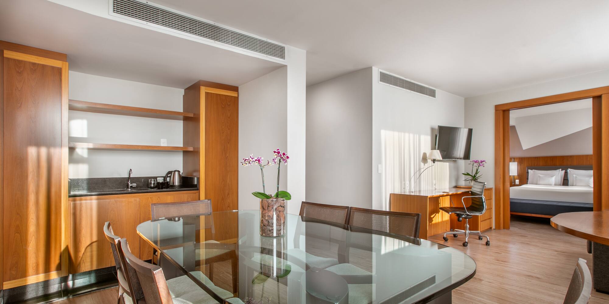 a room with a table and chairs