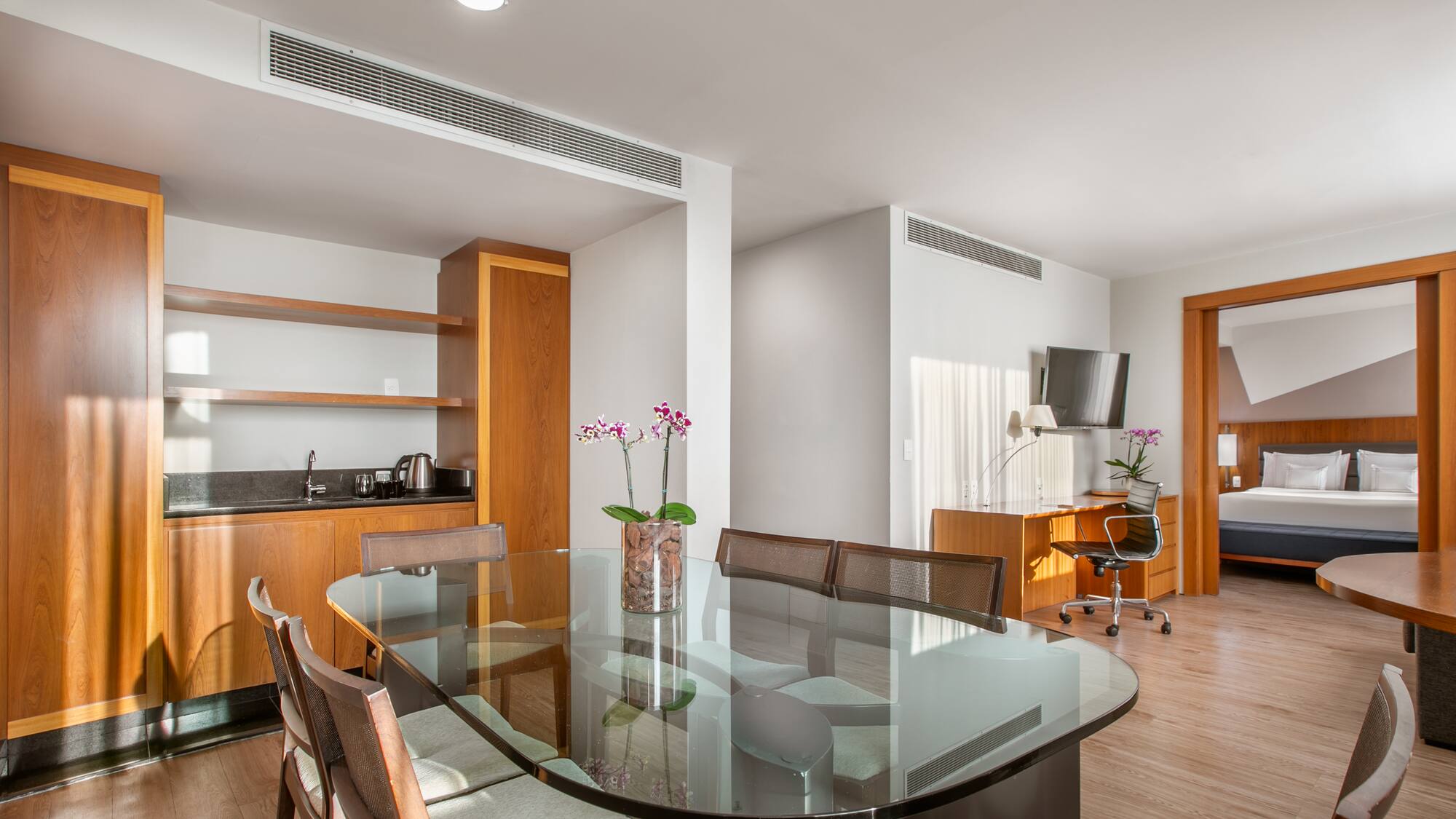 a room with a table and chairs