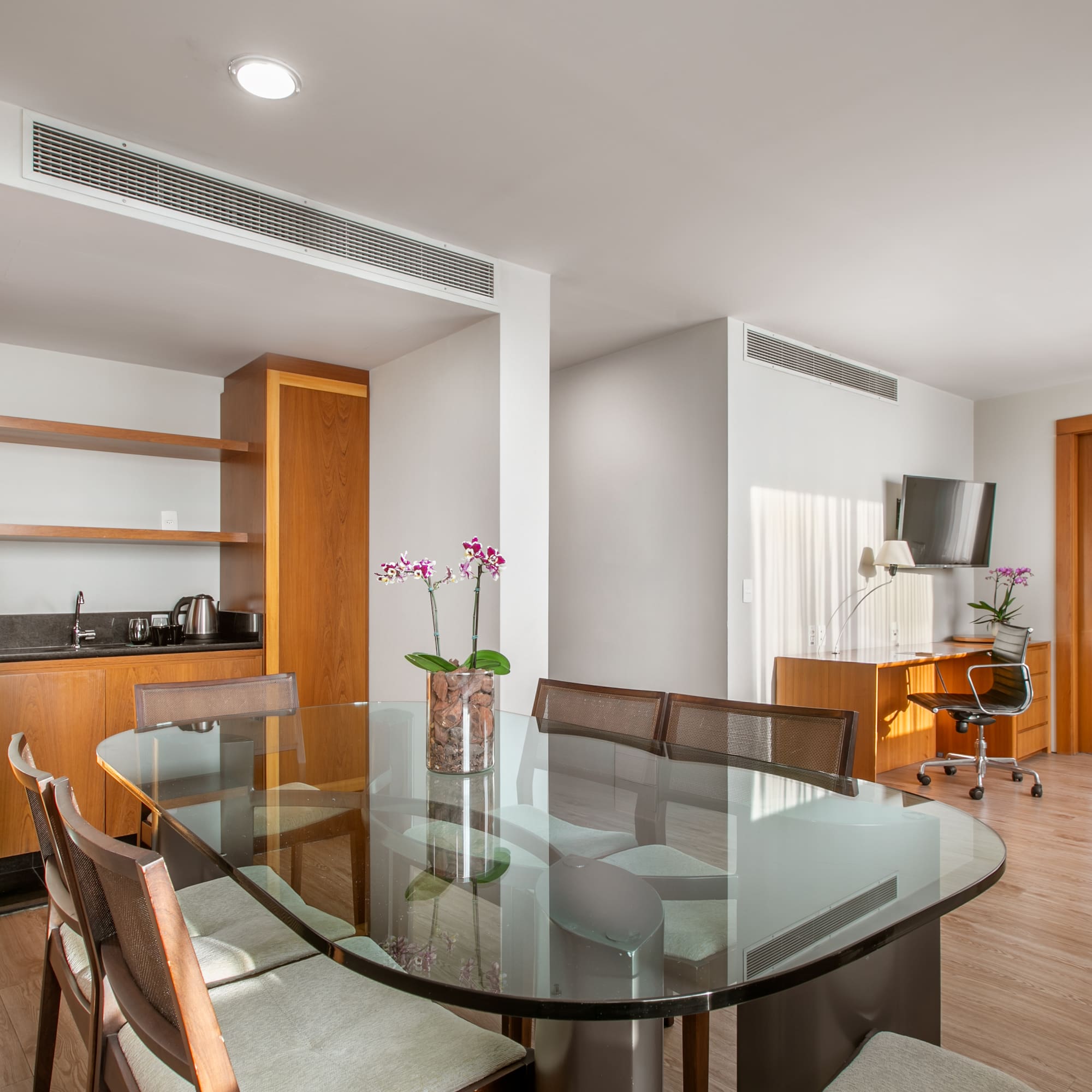 a room with a table and chairs