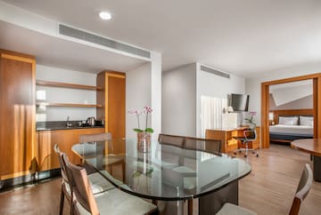 a room with a table and chairs