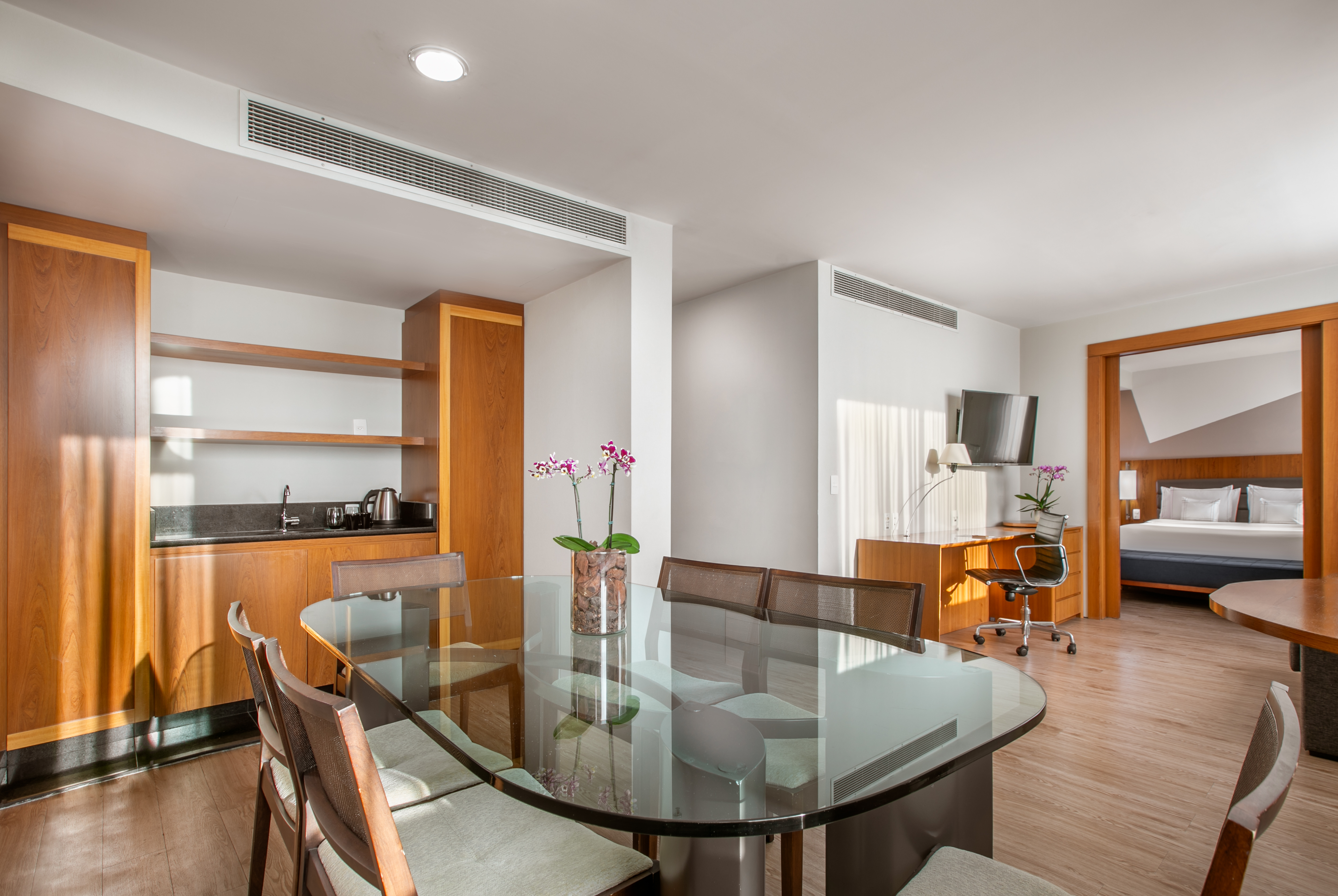 a room with a table and chairs