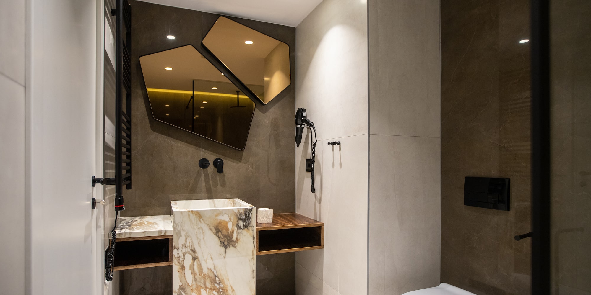 a bathroom with a sink and a toilet