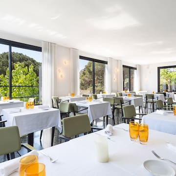 a room with tables and chairs