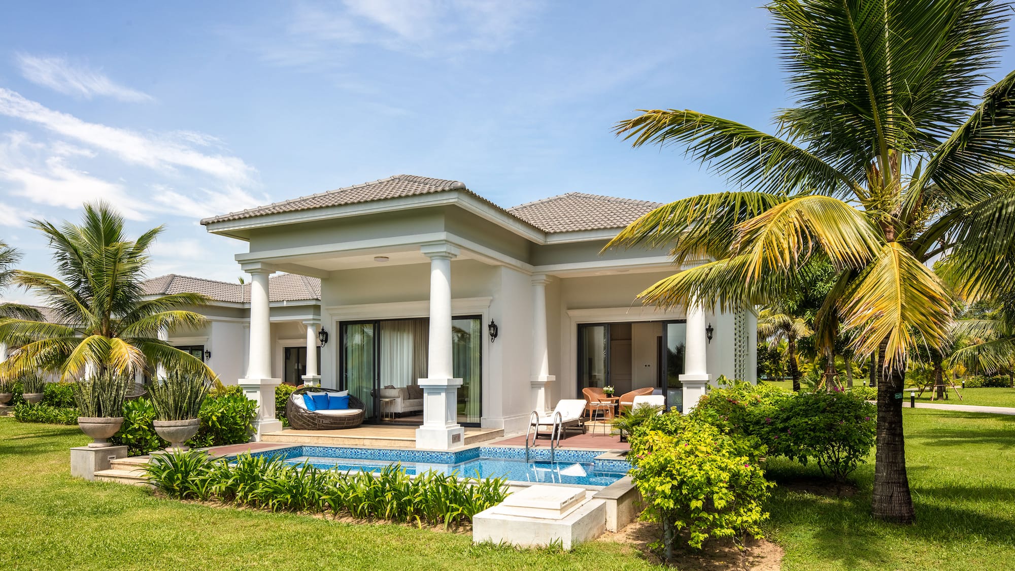 a house with a pool in the back