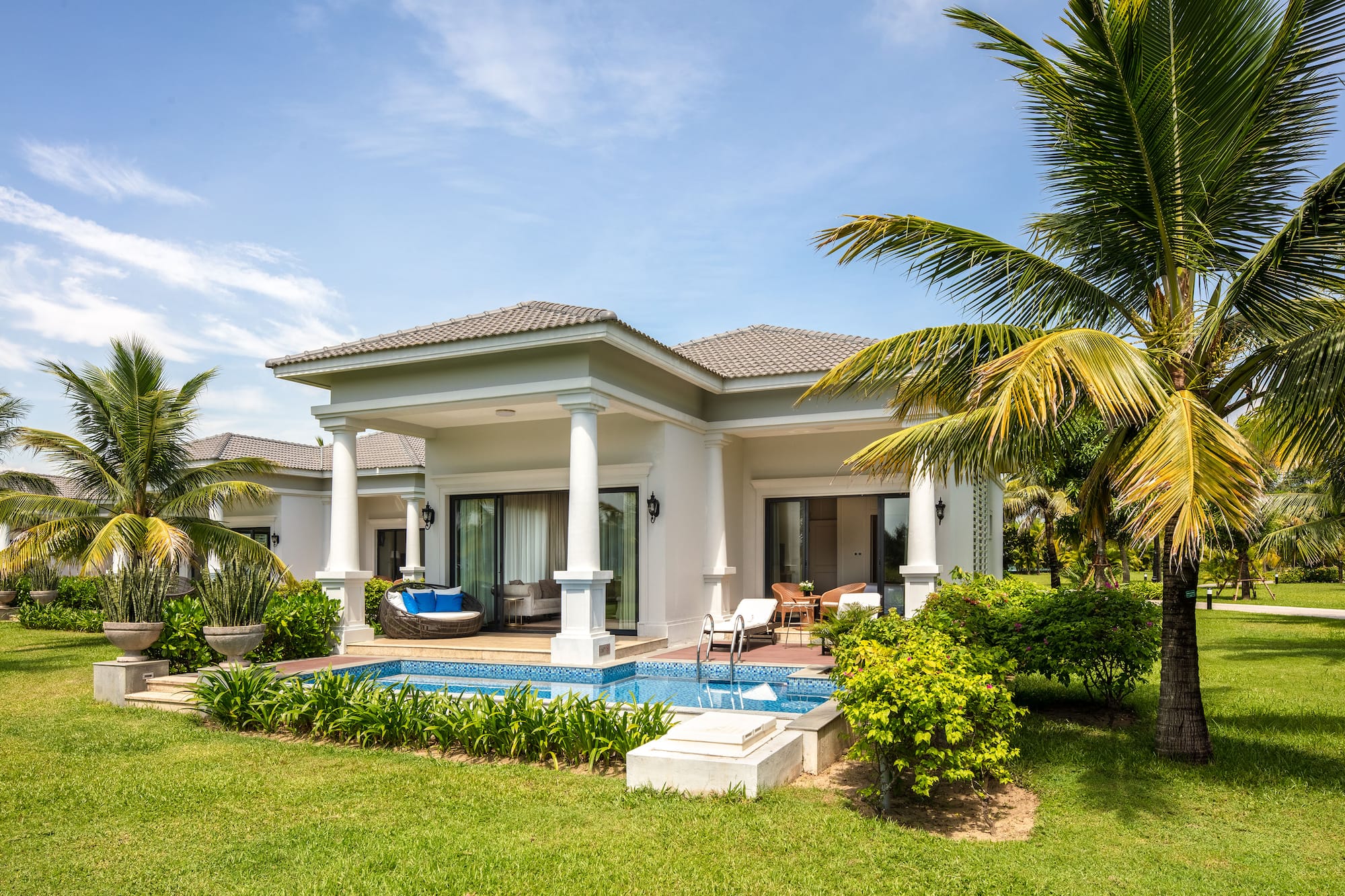 a house with a pool in the back