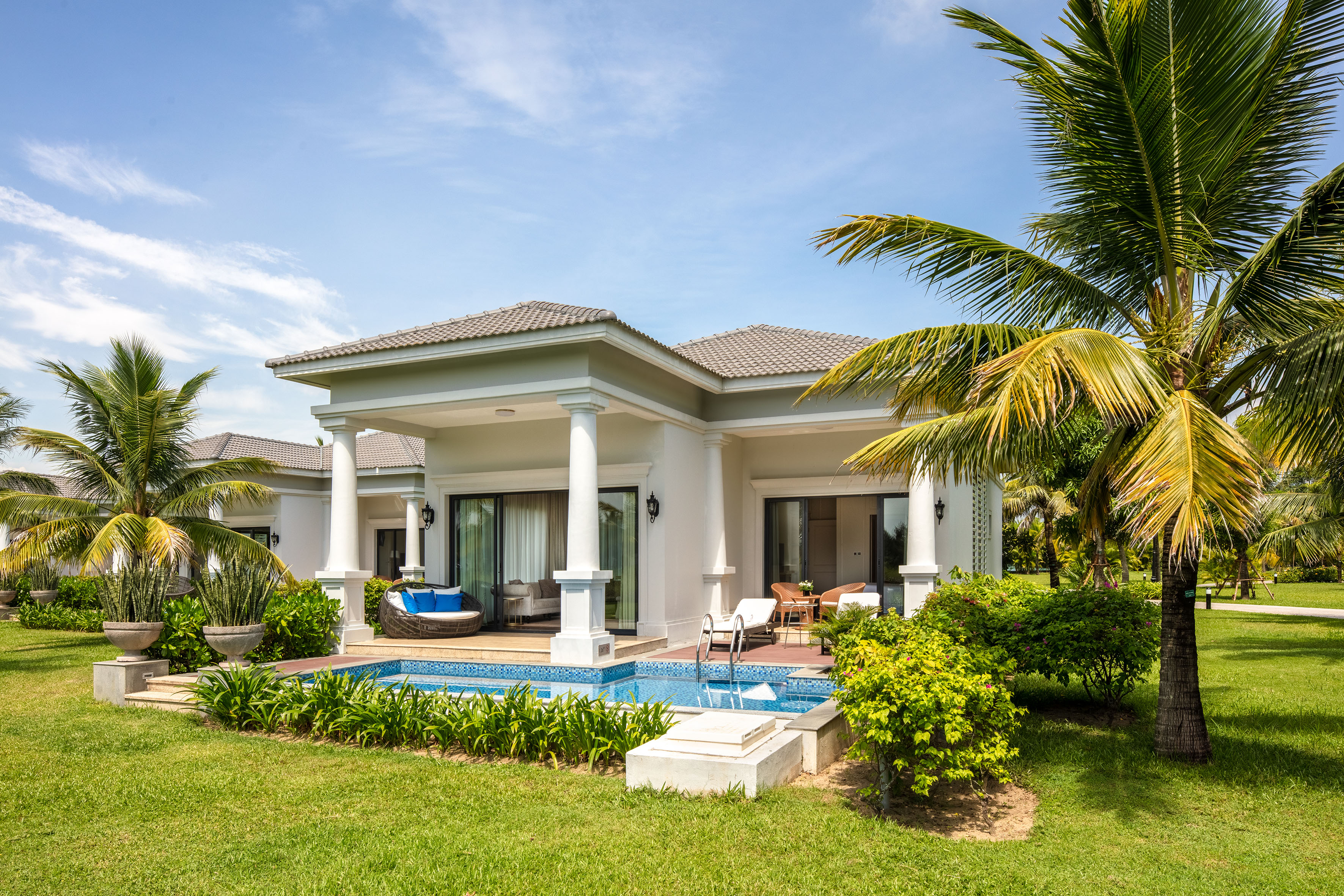 a house with a pool in the back
