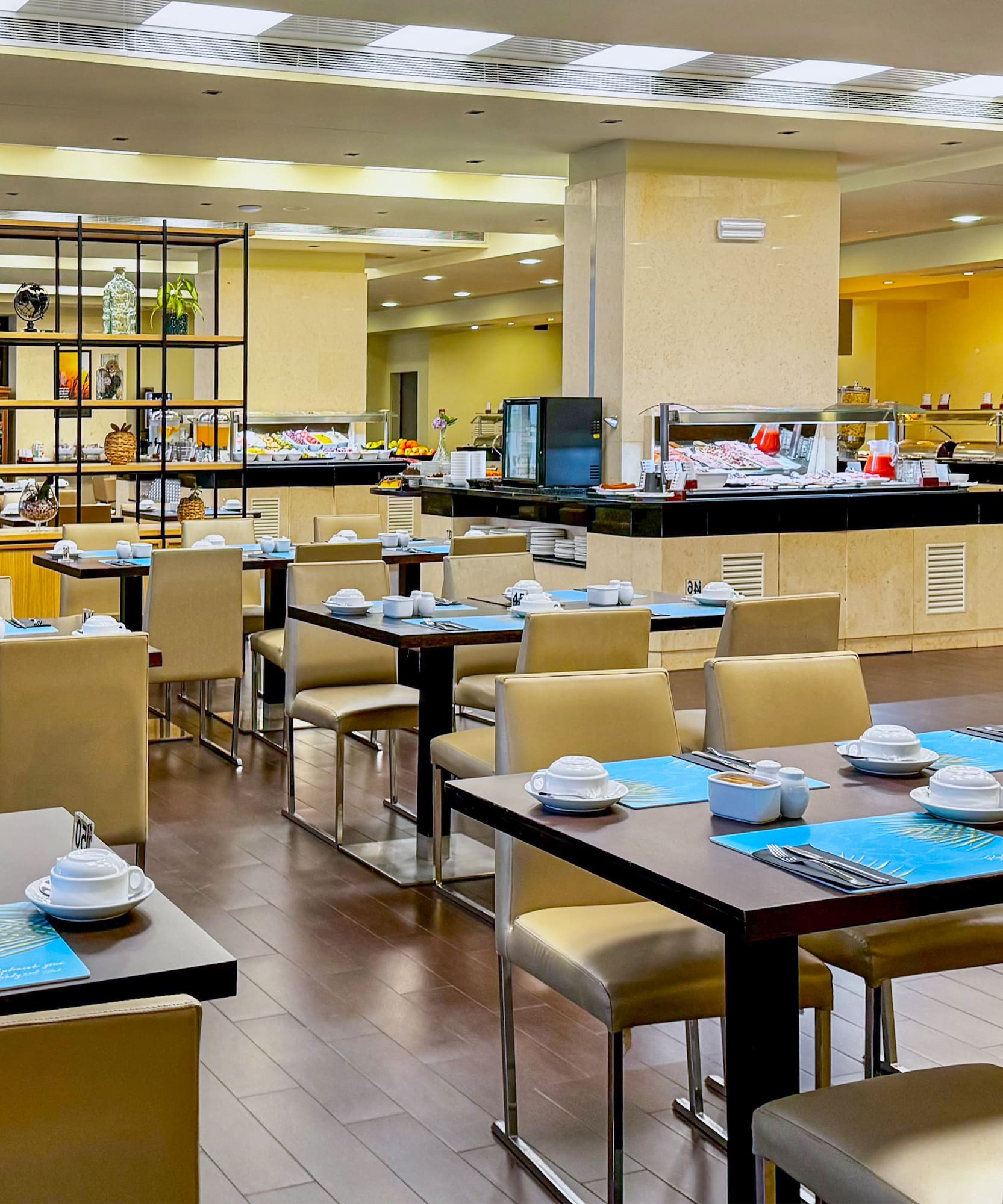 a restaurant with tables and chairs