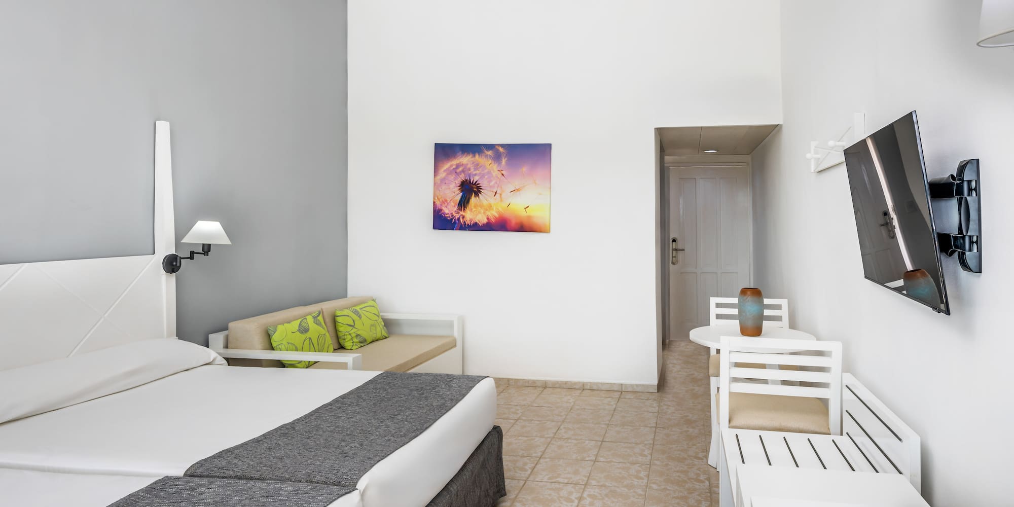 a room with a bed and a table