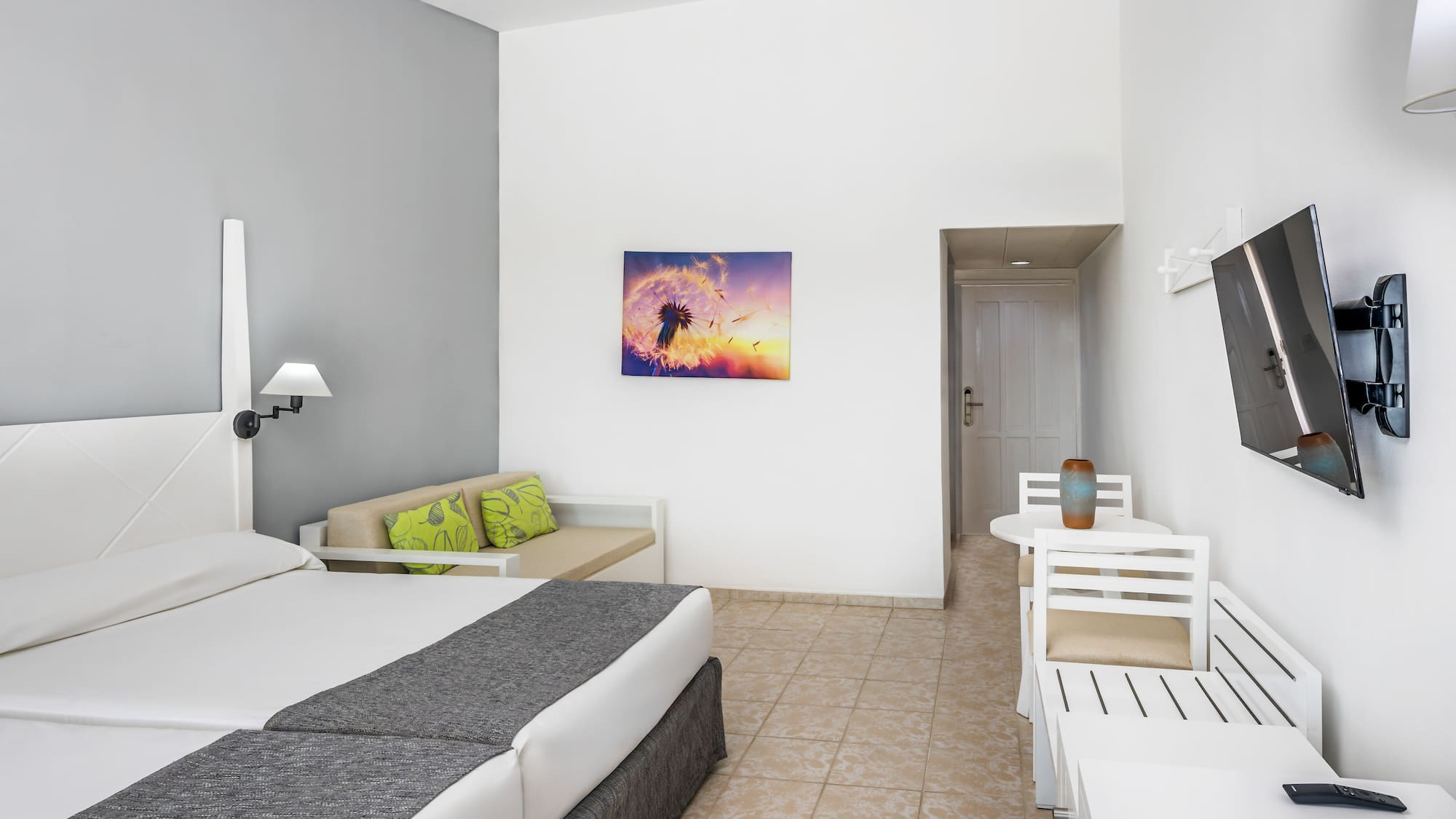 a room with a bed and a table