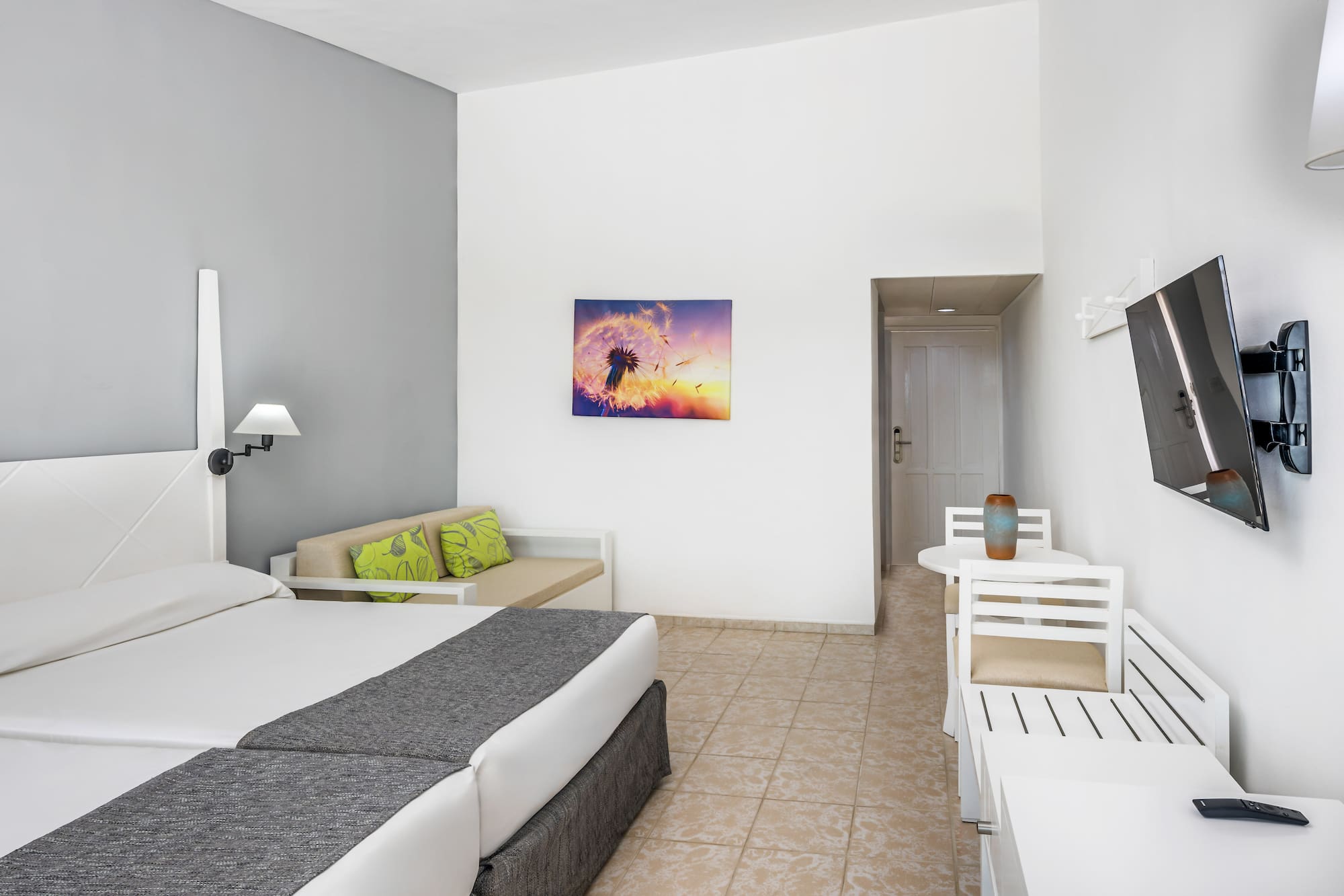 a room with a bed and a table