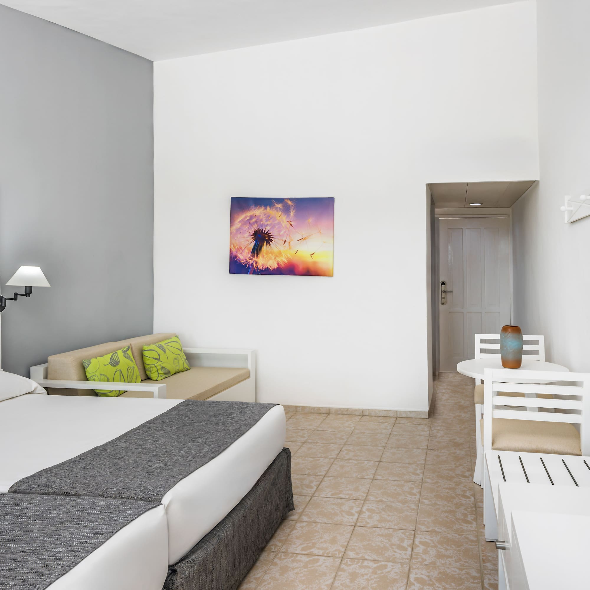 a room with a bed and a table