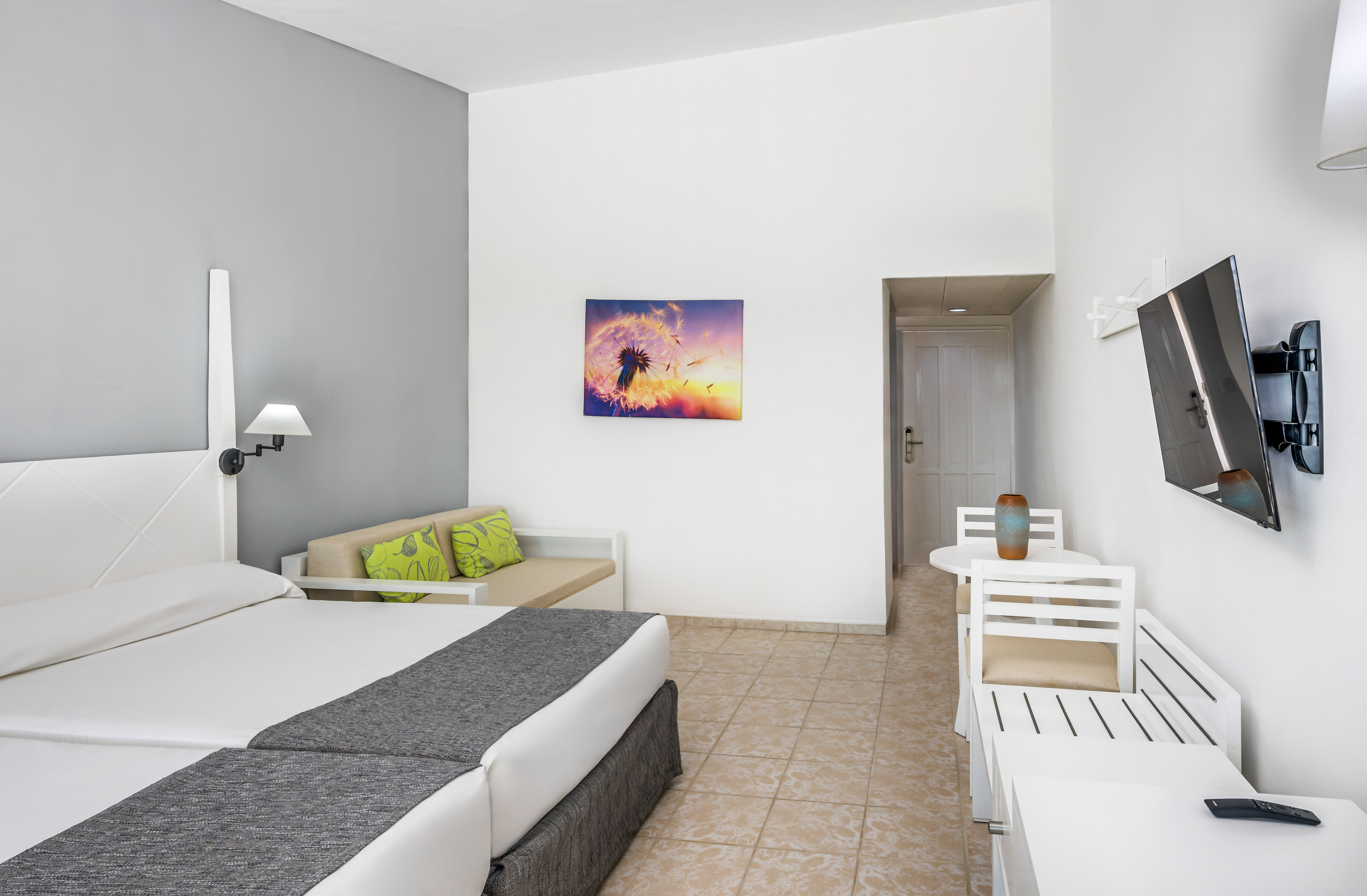 a room with a bed and a table